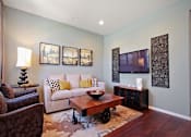 Thumbnail 9 of 45 - a living room with a couch and a table at The Vines at Riverpark, LLC, Oxnard, 93036