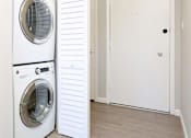 Thumbnail 11 of 14 - a washer and dryer in a room next to a closet at The Pier at Sausalito, Sausalito