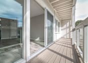 Thumbnail 6 of 14 - a view of the balcony of a home with large glass doors at The Pier at Sausalito, Sausalito, CA 94965