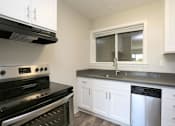 Thumbnail 7 of 14 - a kitchen with a stove and a sink and a window at The Pier at Sausalito, Sausalito