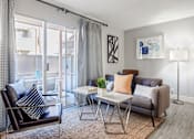 Thumbnail 18 of 25 - a living room with a couch and a table at Parc Medallion LLC, Union City California