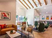 Thumbnail 12 of 25 - a living room filled with furniture and a table with chairs at Parc Medallion LLC, Union City, CA 94587
