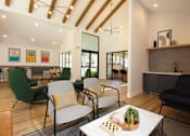 Thumbnail 6 of 25 - a living room with chairs and a table at Parc Medallion LLC, Union City, CA
