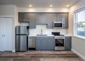 Thumbnail 12 of 28 - Modern kitchen at 888 Fourth Street Apartments, LLC, Santa Rosa, California
