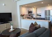 Thumbnail 14 of 28 - Living Room With TV at 888 Fourth Street Apartments, LLC, California