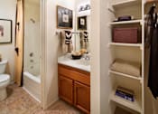Thumbnail 6 of 21 - A bathroom with a toilet, sink, and a shower. at The Maddox Sunnyvale Apartments, Sunnyvale, California
