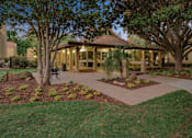 Thumbnail 10 of 90 - a patio with a gazebo and trees at Summerwood Apartments, Santa Clara, CA 95050