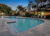 Thumbnail 33 of 90 - the swimming pool at the resort at dusk at Summerwood Apartments, Santa Clara