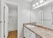 Thumbnail 44 of 90 - a bathroom with a sink and a mirror at Summerwood Apartments, Santa Clara, CA