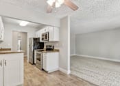 Thumbnail 80 of 90 - an open kitchen and living room with an open floor plan at Summerwood Apartments, Santa Clara, 95050