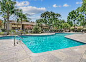 Thumbnail 57 of 90 - a swimming pool at Summerwood Apartments, Santa Clara, CA