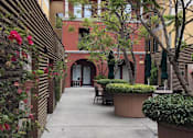 Thumbnail 11 of 23 - A Courtyard With a Table at Atrium Garden Apartment Homes, LLC, San Jose, 95112