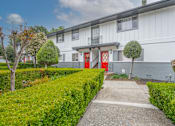 Thumbnail 12 of 40 - a white house with red doors and a sidewalk in front of it at Danville Park, Danville, 94526