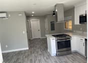 Thumbnail 26 of 40 - an empty kitchen with white cabinets and a stove  at Danville Park, Danville, California