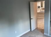 Thumbnail 40 of 40 - an empty living room with a door to a kitchen at Danville Park, Danville, CA