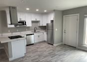 Thumbnail 28 of 40 - an empty kitchen with white cabinets and counter tops at Danville Park, California, 94526