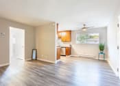 Thumbnail 21 of 25 - an empty living room and kitchen with a wood floor at Element LLC, Sunnyvale, CA, 94086