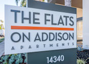 Thumbnail 17 of 31 - a sign that says the flats on admission apartments at The Flats on Addison, Sherman Oaks