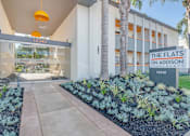 Thumbnail 6 of 31 - the flats on adelaide building entrance with palm trees at The Flats on Addison, Sherman Oaks, 91423