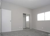 Thumbnail 10 of 19 - Carpeted Bedroom at The Marq Apartments LLC, California