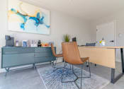 Thumbnail 12 of 18 - a desk and chair in a room with a door at BLVD Apartments LLC, Tarzana, 91356