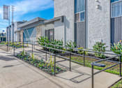 Thumbnail 11 of 18 - a building with stairs and plants in front of itat BLVD Apartments LLC, California