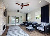 Thumbnail 20 of 44 - a living room with a couch and chairs and a fireplaceat The Bryant, Yorba Linda California
