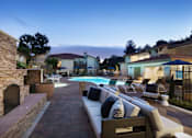 Thumbnail 6 of 44 - a backyard with a pool and patio furniture at The Bryant, California