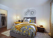 Thumbnail 17 of 44 - a bedroom with a bed and two mirrors on the wallat The Bryant, California, 92887