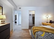 Thumbnail 16 of 44 - a bedroom with a bed and a closetat The Bryant, California