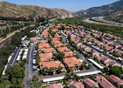 Thumbnail 4 of 44 - an aerial view of a neighborhood with houses and trees at The Bryant, Yorba Linda, CA 92887