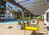Thumbnail 24 of 27 - the pool area at the club with yellow tables and chairs at La Jolla Blue, San Diego, CA