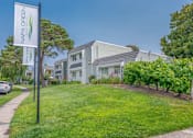 Thumbnail 7 of 24 - a house with a yard and a sign in front of it at Napa Green Apartments LLC, Napa