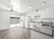 Thumbnail 1 of 45 - Kitchen with countertop at Ocean Villas Apartments, California, 93033