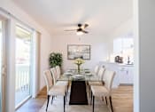 Thumbnail 4 of 83 - A dining room with a table set for six at Summerwood Apartment , California, 95050