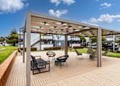 Thumbnail 32 of 32 - Stylish Furnished outdoor patio at The Gates at the Marina Apartments, Marina, CA, California