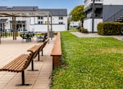 Thumbnail 26 of 32 - Seating In Open Breezeway at The Gates at the Marina Apartments, Marina, CA, California, 93933