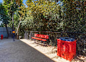 Thumbnail 6 of 9 - Dog park sitting area