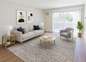 Thumbnail 4 of 11 - A living room with a couch, chair, and table.