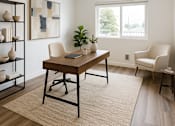 Thumbnail 5 of 11 - A room with a desk, chair, and shelf with vases.