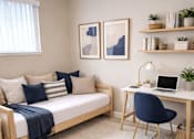 Thumbnail 7 of 14 - A cozy room with a bed, desk, and chair.