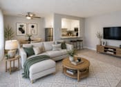 Thumbnail 1 of 13 - A living room with a white couch, a wooden coffee table, and a flat-screen TV mounted on the wall.