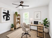 Thumbnail 2 of 10 - A room with a desk, chair, and a ceiling fan.