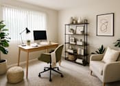 Thumbnail 5 of 9 - A home office with a desk, chair, and shelves.
