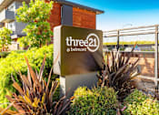Thumbnail 9 of 9 - a sign for three 21 in the garden of a building