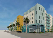 Thumbnail 13 of 14 - A modern multi-story building with a blue and yellow facade.