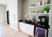 Thumbnail 12 of 47 - a kitchen with a counter and a sink and a door