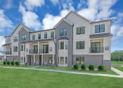 Thumbnail 1 of 63 - A modern two-story house with a large front yard at The Franklin Marlboro Apartments, Marlboro