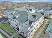 Thumbnail 2 of 11 - an aerial view of an apartment building with green roofs at The Franklin at Hillsborough Apartments, Hillsborough, NJ