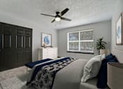 Thumbnail 6 of 19 - a bedroom with a bed and a ceiling fan